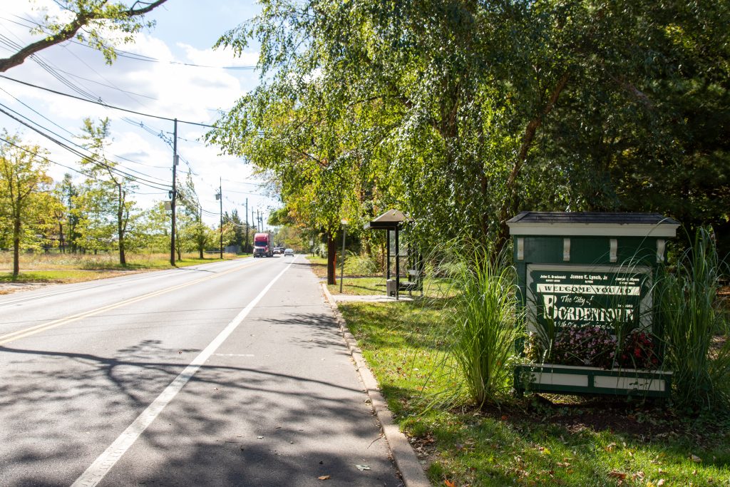 Sign on shoulder of roadway