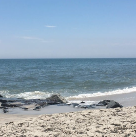 Picture of the ocean surf and sand