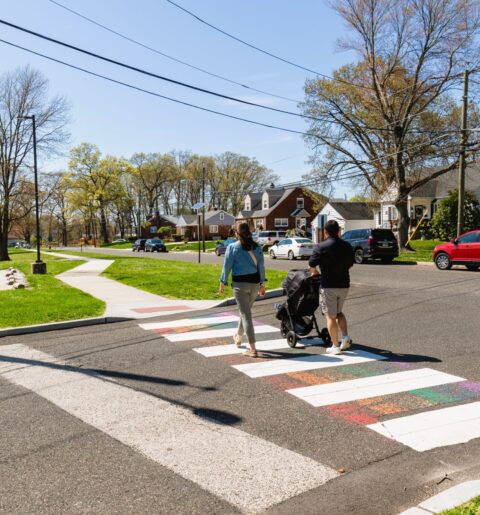 couple walking on crosswalk